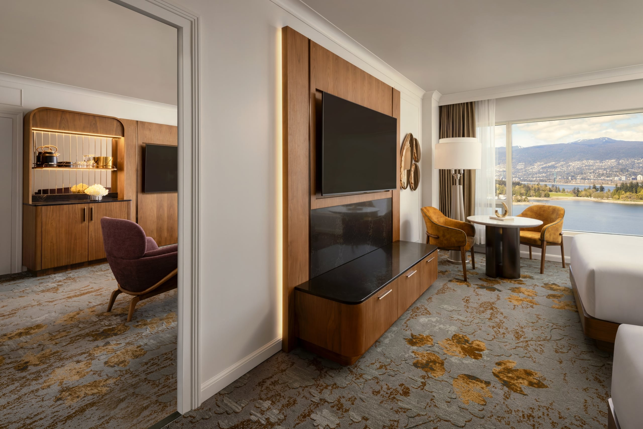 Newly renovated Harbour View Suite at Fairmont Waterfront available in one- or two-bedroom layouts, featuring floor-to-ceiling windows with sweeping harbour views, spacious living areas, and modern coastal design in downtown Vancouver.