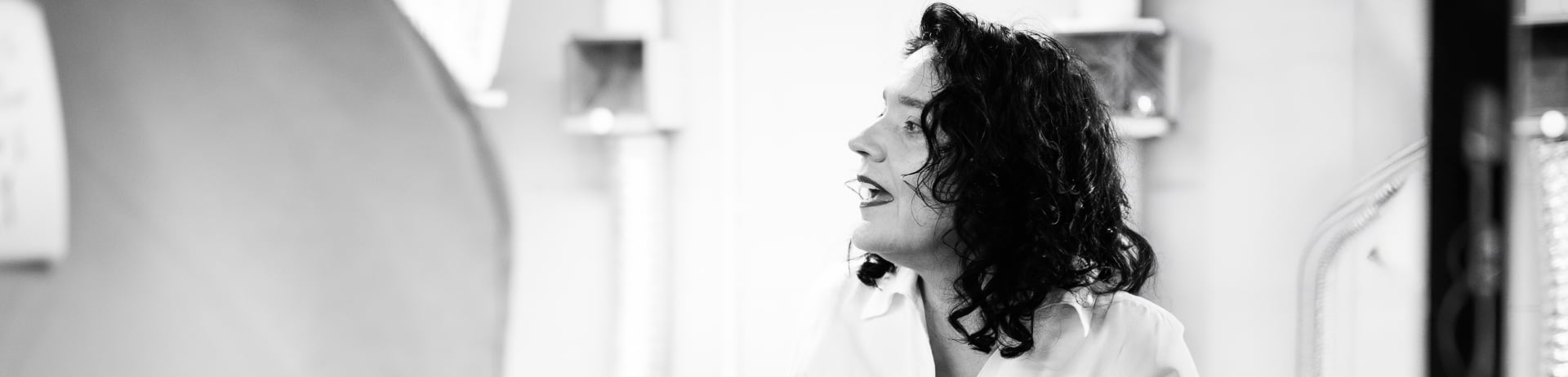 Yolonda Skelton Jackson, Indigenous Artist and Fashion Designer of The Gitxsan Nation in her studio